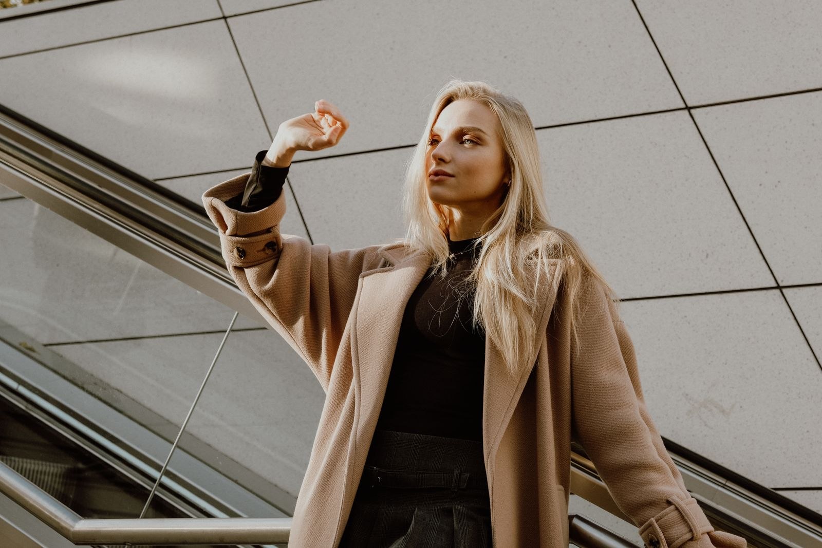 Woman wearing a long winter coat outdoors