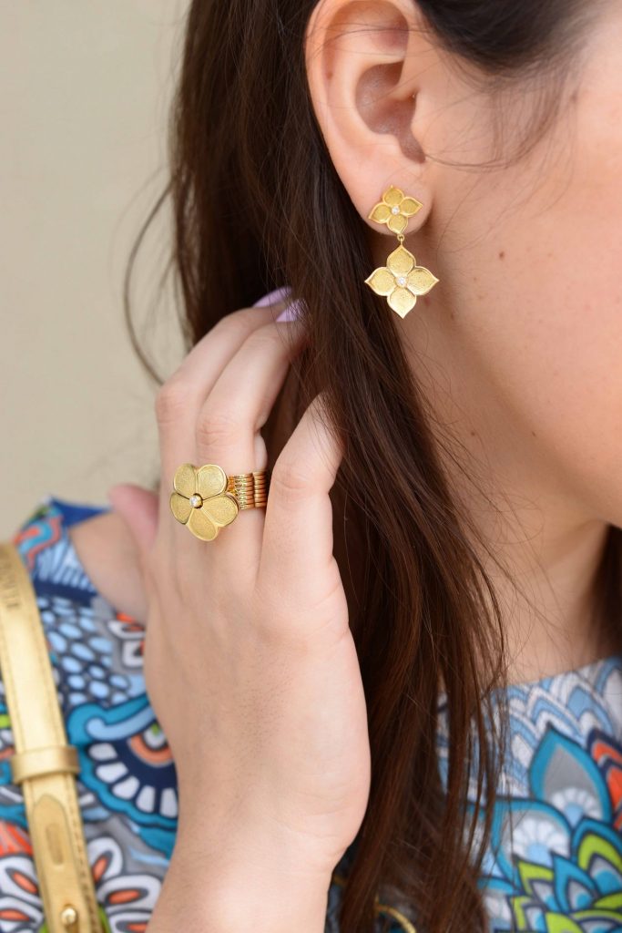 Gumuchian gold lotus earrings & daisy cycle ring 