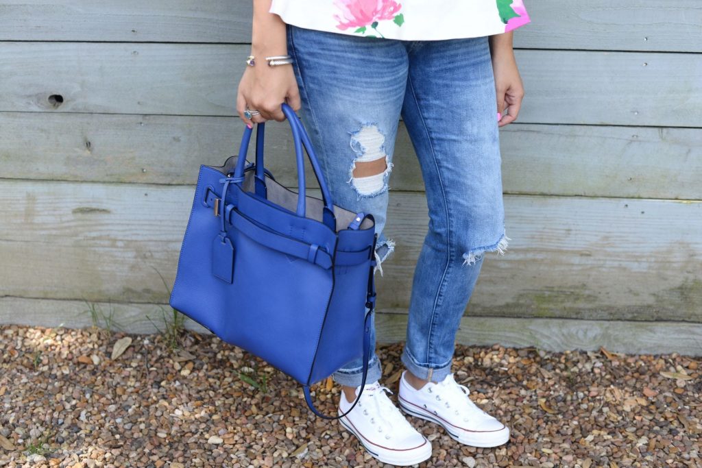 Distressed denim + Reed Krakoff