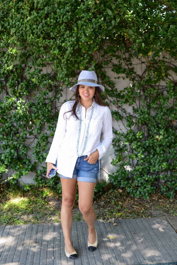 half-tucked white button-down
