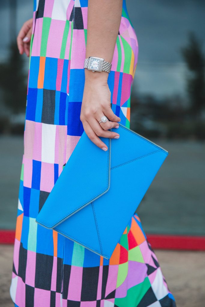cushion cut engagement ring and envelope clutch