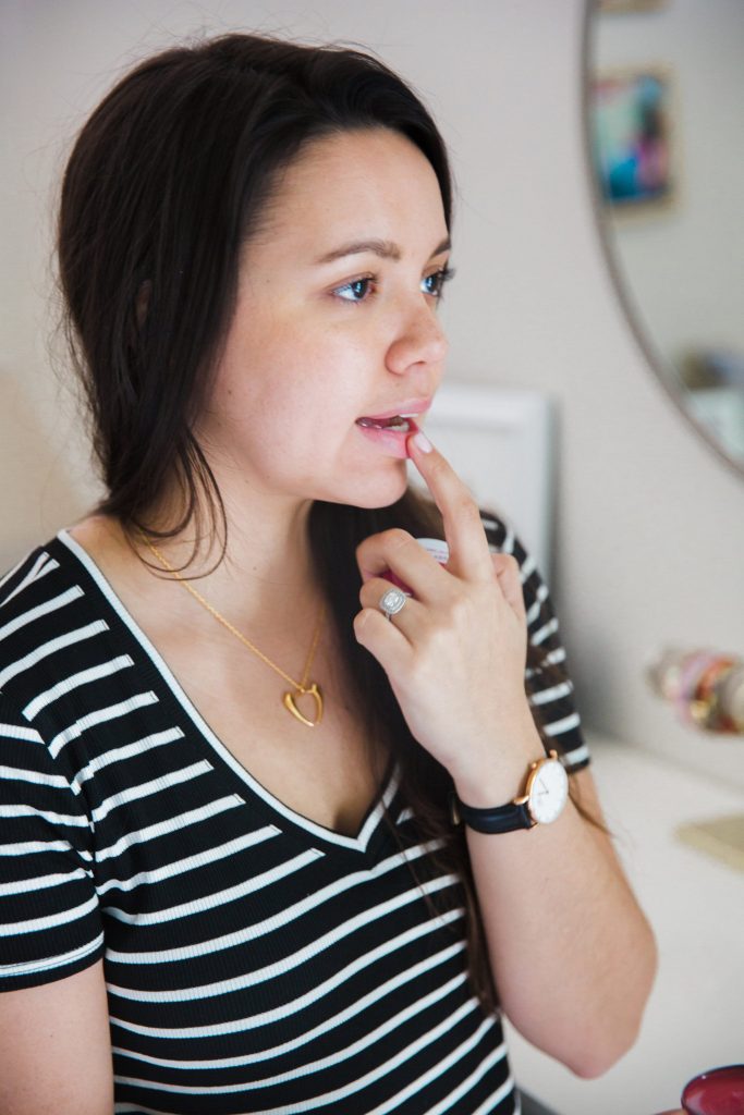striped v-neck tee and gold necklace