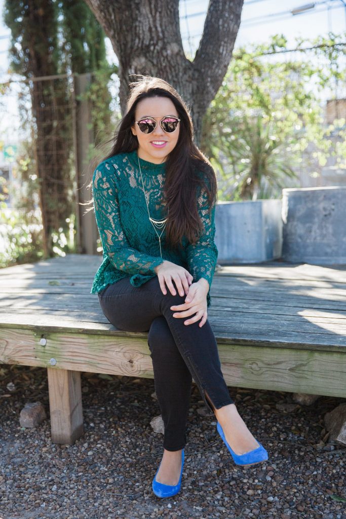 green lace top and black jeans