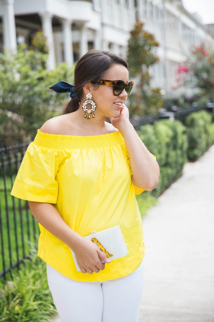 Tortoise sunglasses and statement earrings