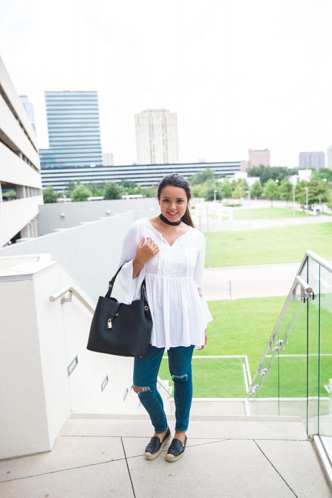 white peasant blouse and black hobo purse