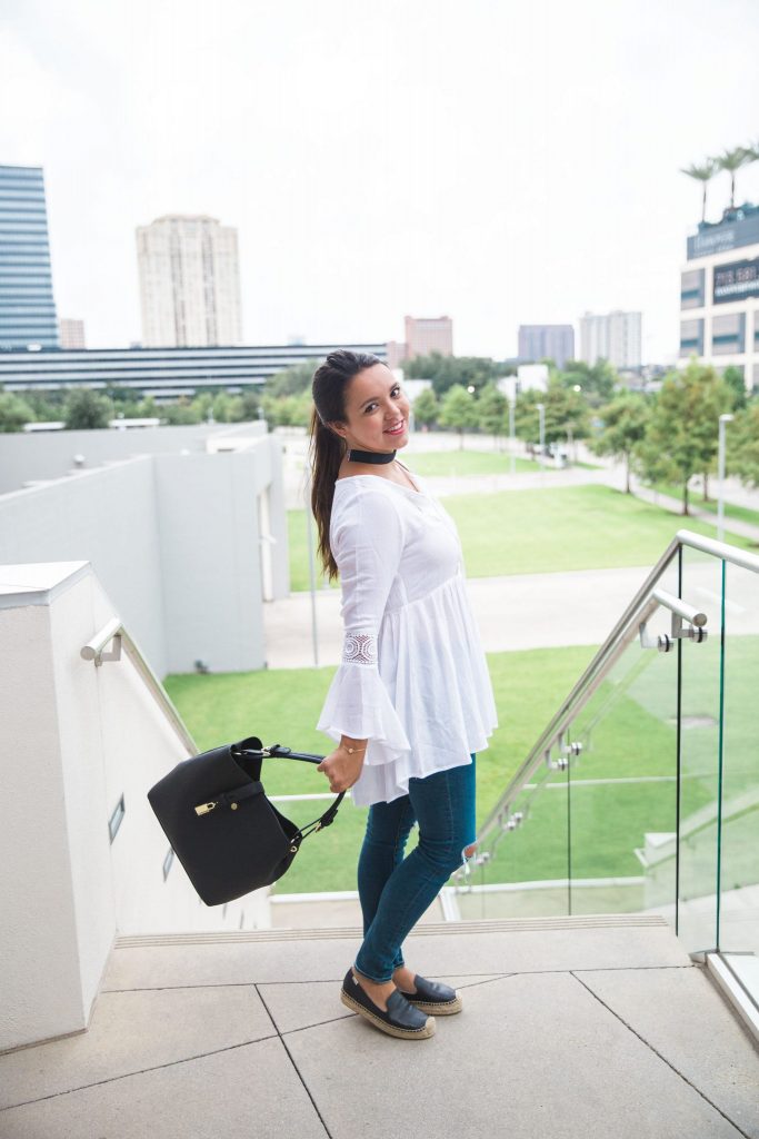 black hobo bag and white peasant blouse