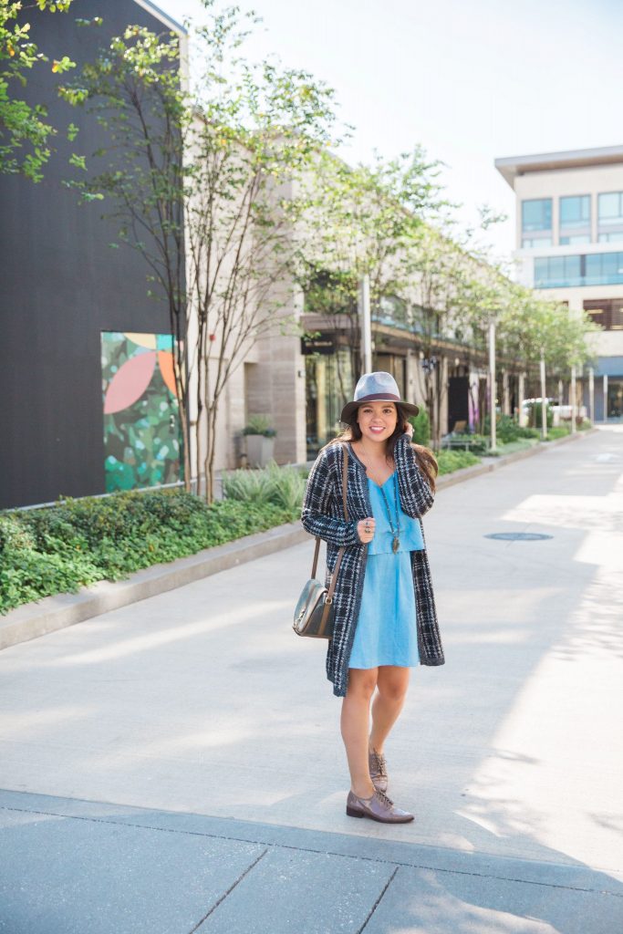 Duster cardigan layered over a chambray dress