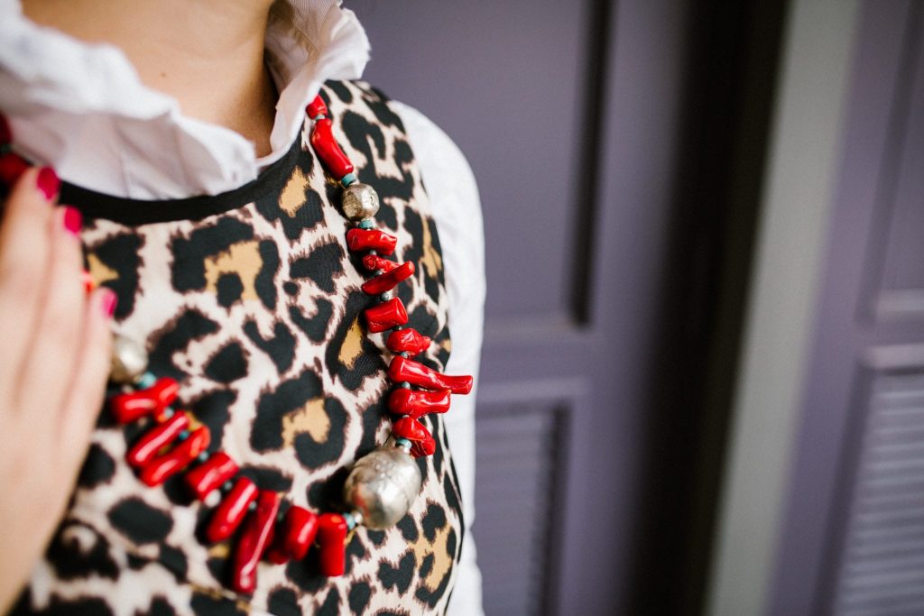 Leopard print dress and red statement necklace