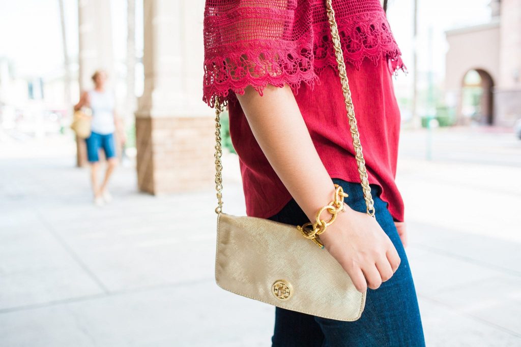 Tory Burch gold clutch and Julie Vos link bracelet