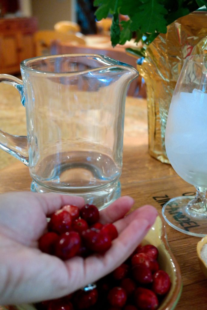 Grabbing some fresh cranberries to mix into a fresh Thanksgiving cocktail