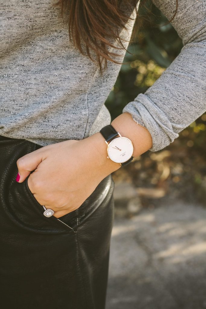 A gorgeous cushion cut diamond ring and classic leather band watch