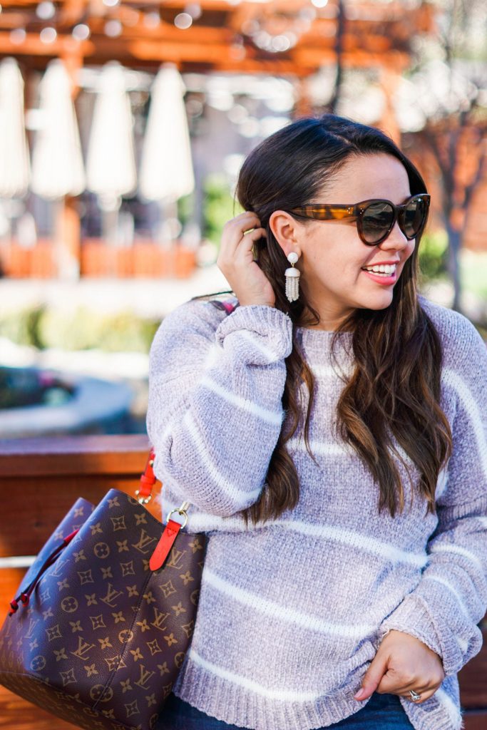 striped fuzzy sweater with tassel earrings