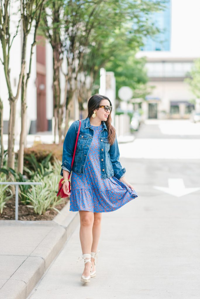 Denim jacket paired with a dress