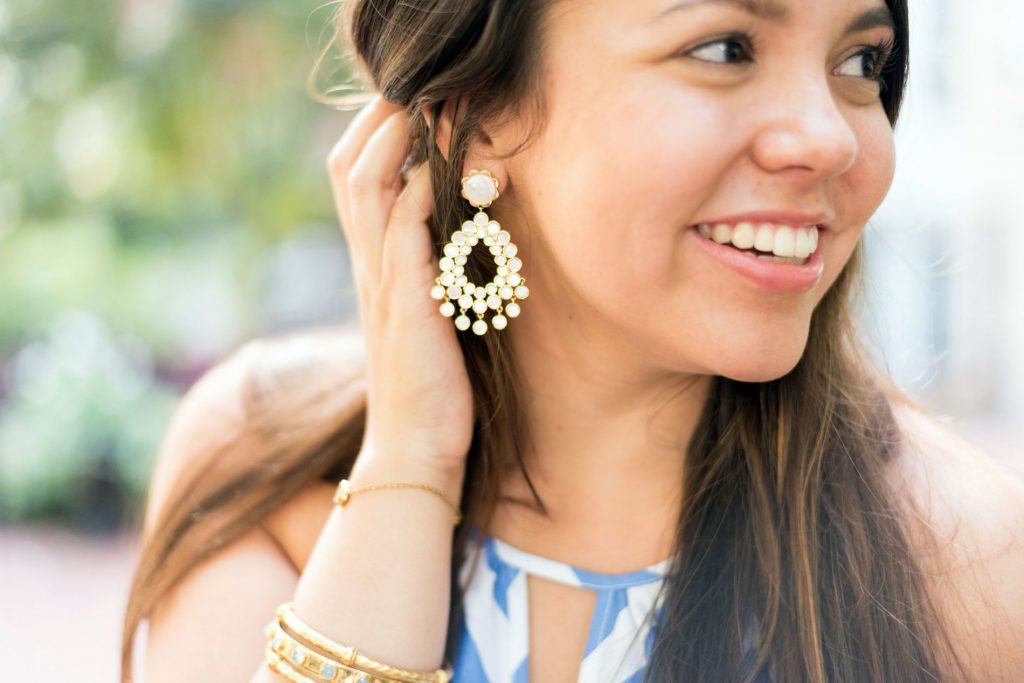 mother of pearl, gold statement earrings by ASHA