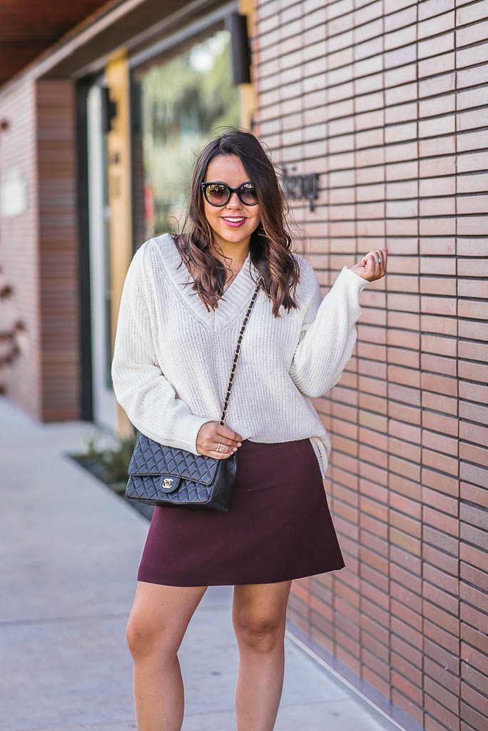styling an oversized skirt with a mini skirt for fall 