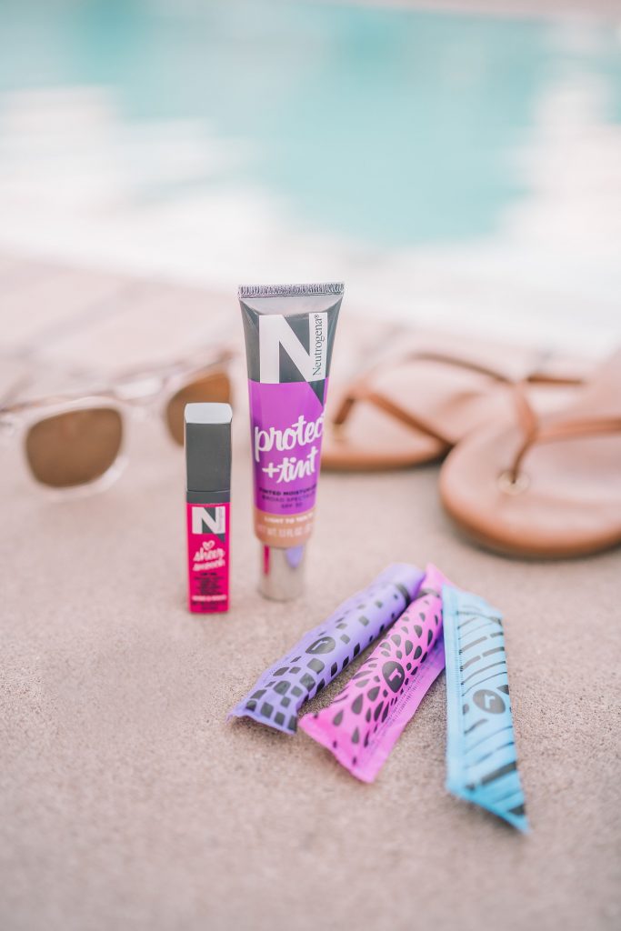 Neutrogena Tinted Moisturizer and sheer lip oil in my pool bag