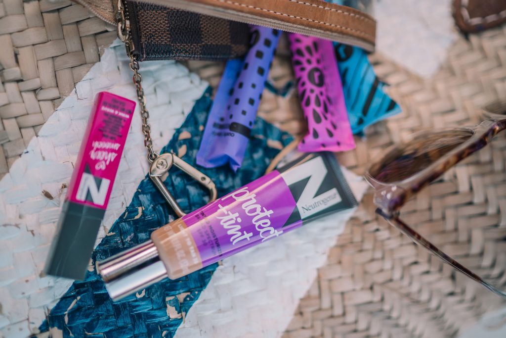 Neutrogena beauty essentials in a pool and beach bag