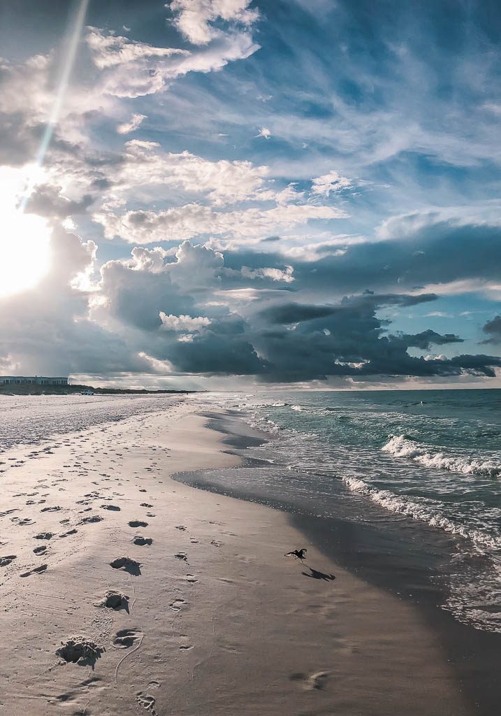 Light in the darkness, sunrise on the beach 