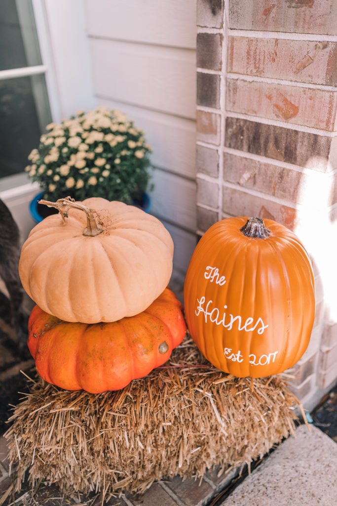 Decorating for fall with a hay bale and Fairytale pumpkins