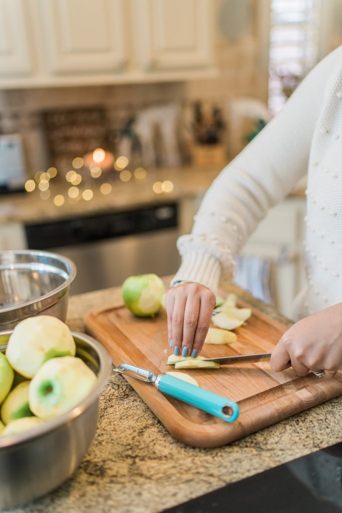 peeling and cutting apples for apple pie