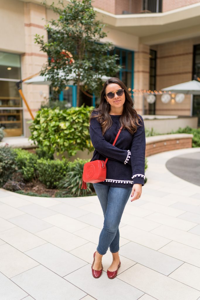 Preppy pom pom trim sweater outfit idea for spring