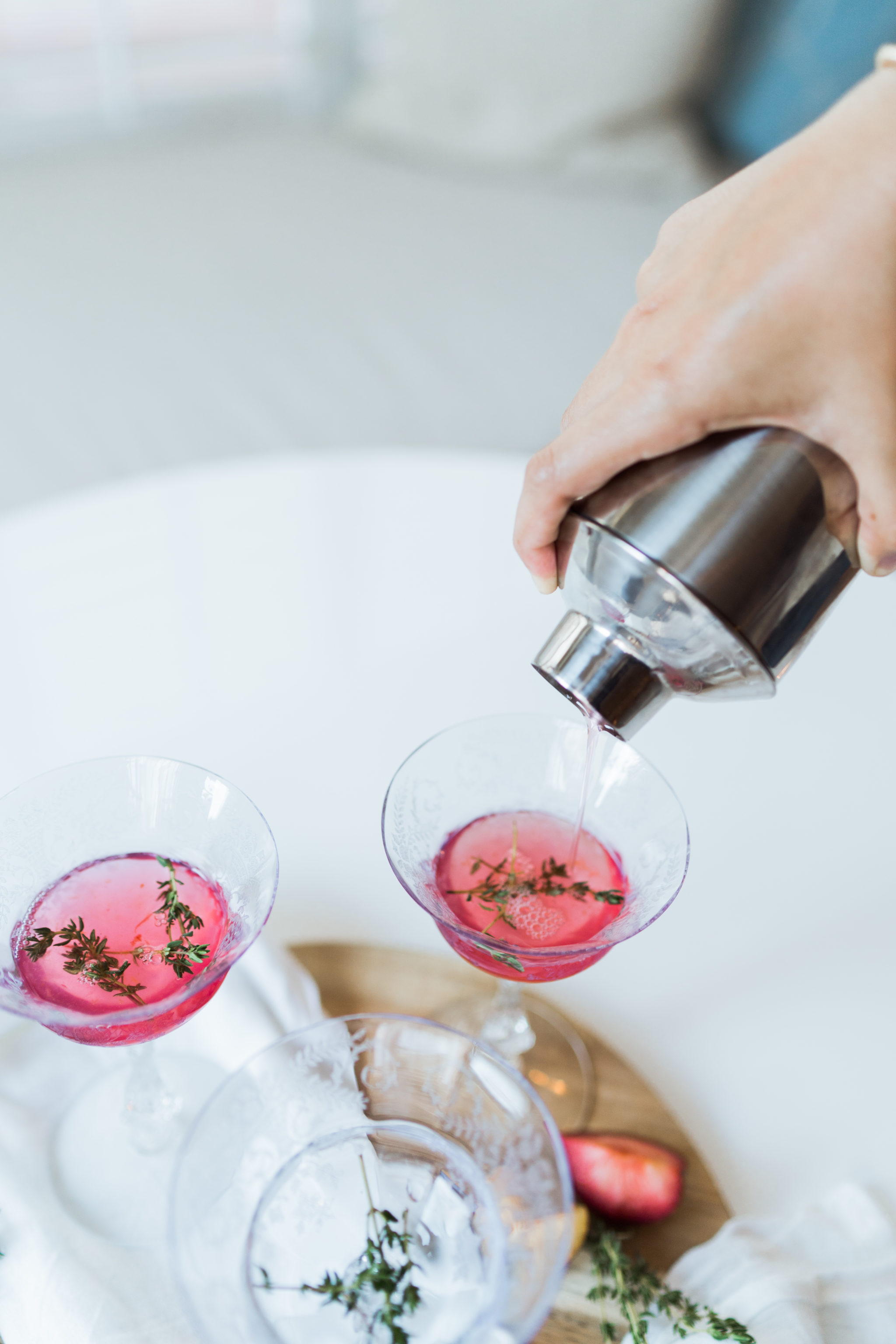 muddled fresh plum and thyme cocktail for fall