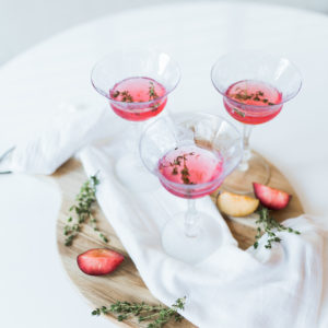 muddled plum and thyme cocktail
