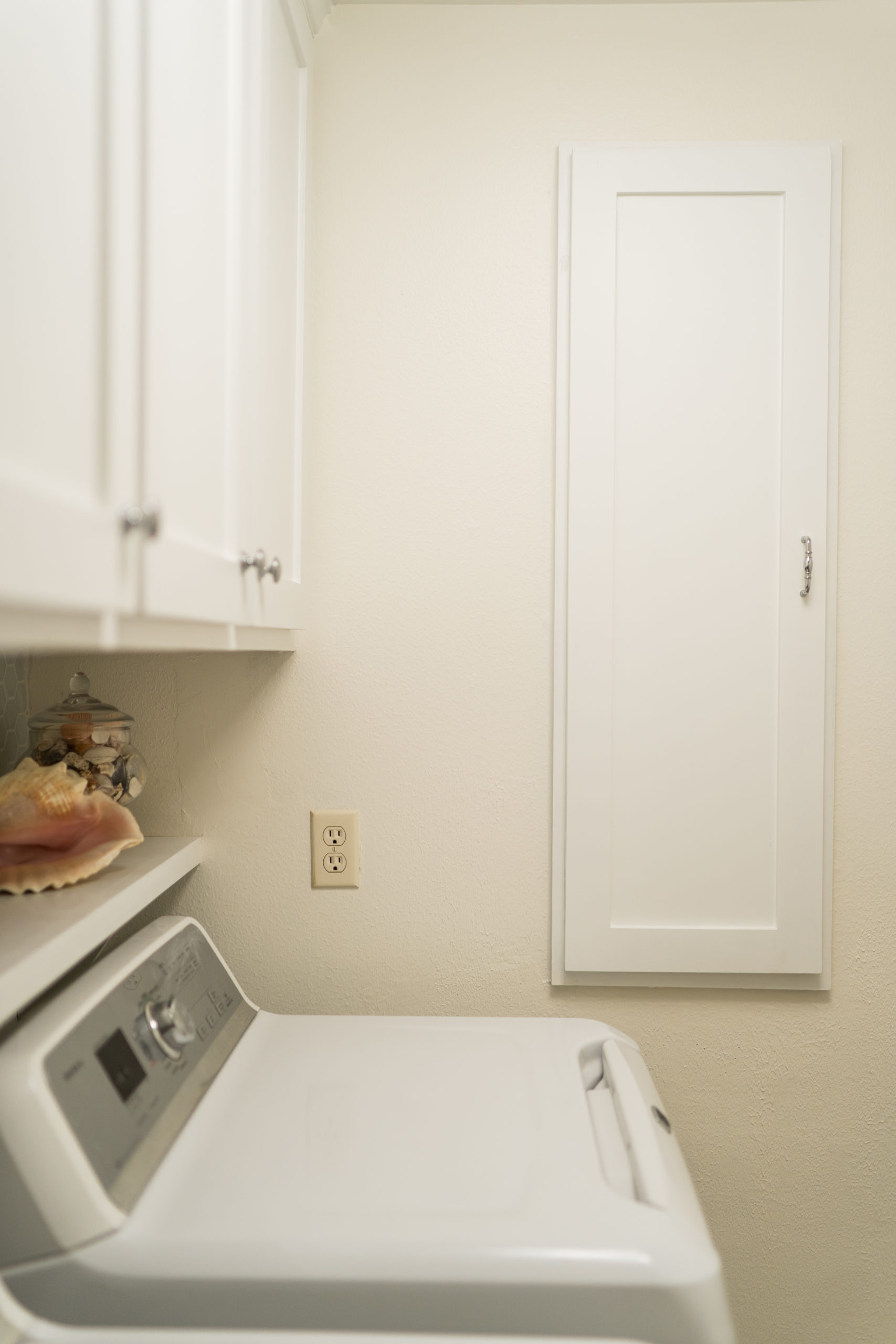 Laundry room custom cabinets and storage space