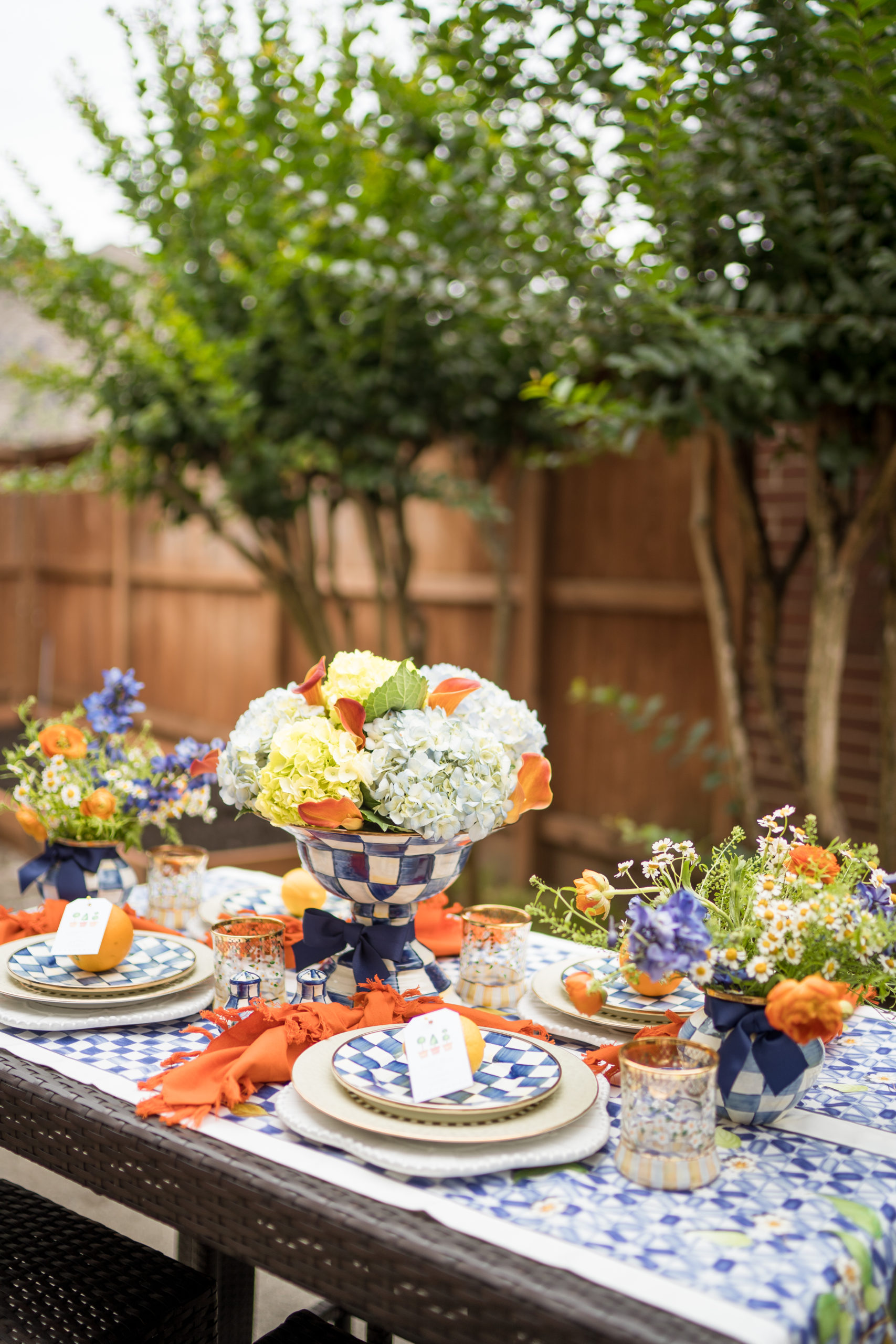 summer al fresco table setting with MacKenzie-Childs