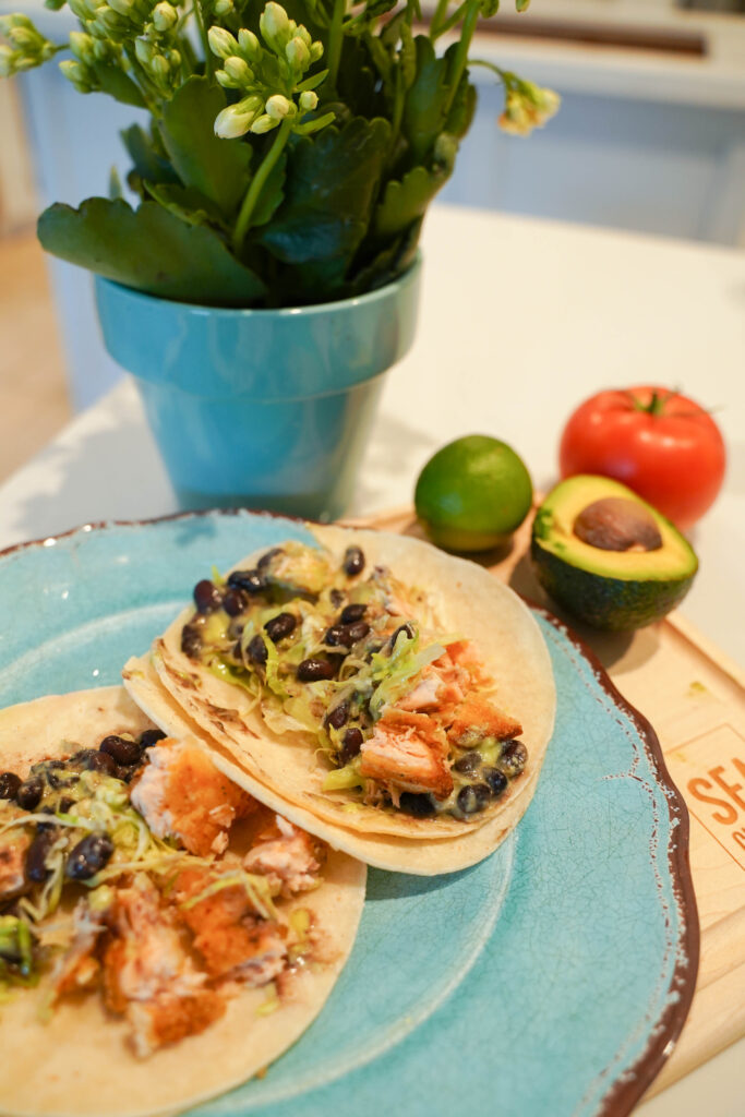 salmon fish tacos with guacamole salsa | Girl Wonder Life