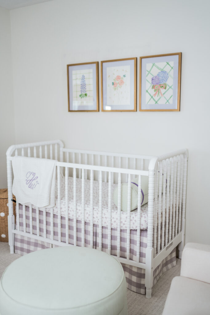 DaVinci Jenny Lind 3-in-1 white crib and Schumacher Camden Cotton check lilac crib skirt with custom commissioned floral artwork | Girl Wonder Life