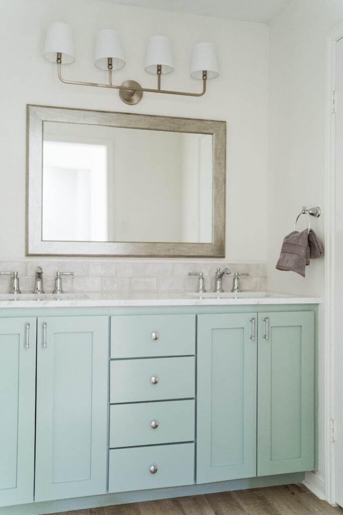 Custom vanity cabinet for primary bathroom renovation by ALE Renovations in Houston, Texas | Girl Wonder Life