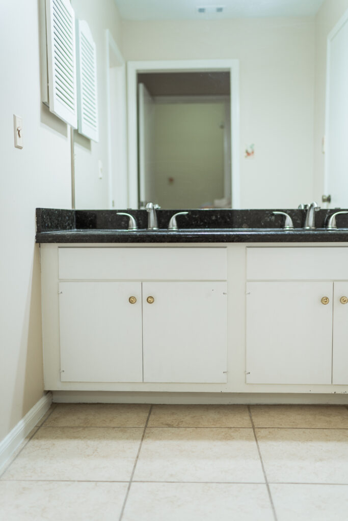 Before & after primary bathroom flip house makeover on a budget | Girl Wonder Life