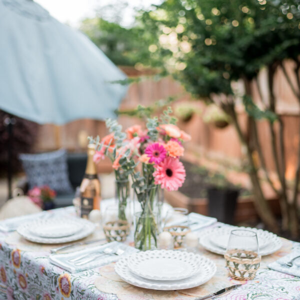 Block print floral table cloth from the Southern Living Home Collection at Dillard's as styled for an intimate outdoor dinner party | Girl Wonder Life