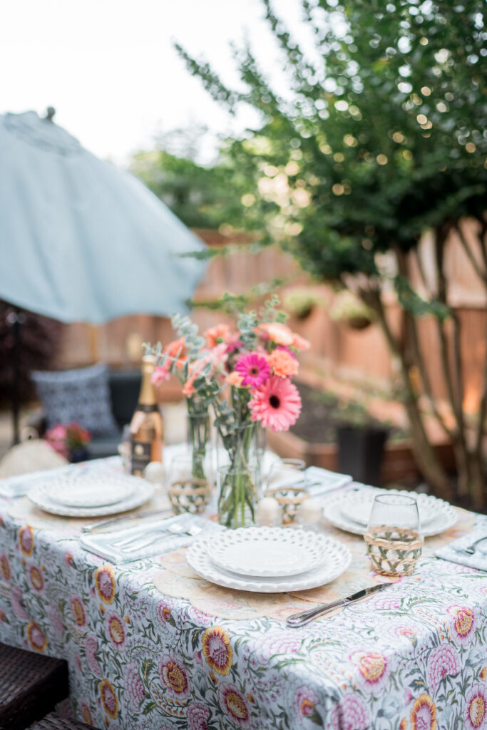 Block print floral table cloth from the Southern Living Home Collection at Dillard's as styled for an intimate outdoor dinner party | Girl Wonder Life